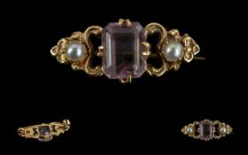 9ct Gold Gem & Pearl Set Brooch, large central gem with pearls each side, in intricate setting.