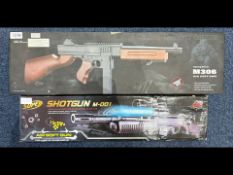 Two BB Guns, boxed, comprising M306 Air Soft Gun and M001 Super Shotgun.