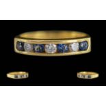 Ladies - Excellent 18ct Gold Channel Set Sapphire / Diamond Set Ring. Full Hallmark to Shank. The