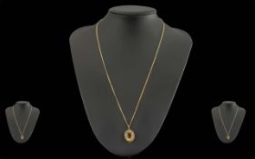 Ladies - Pleasing 9ct Gold Citrine Set Pendant Attached to a 9ct Gold Chain. Both Marked 9ct.