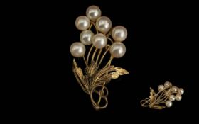 Ladies Pleasing 15ct Gold Pearl Set Brooch In the Form of a Floral Spray. Marked 15ct.