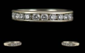 Ladies 14ct White Gold Diamond Set Half Eternity Ring, marked 14ct. Well matched diamonds of good