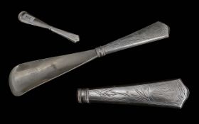 Antique Chinese Silver Shoe Horn, the handle engraved with bamboo branches with monogram and stamped