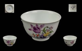 Meissen Marcolimi period tea-bowl finely decorated with the seasons flowers picked out in green and