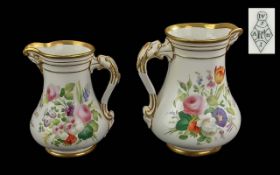 Fine pair of decorated floral jugs, with lion mask handles, presented to J J Mason.