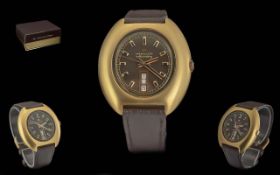 Hamilton Self-winding Day-Date Gold on Steel Watch, featuring iconic shape, black dial, gold batons.