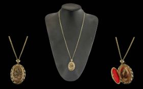 Ladies 9ct Gold Hinged Locket and Attached 9ct Gold Chain. Both Marked 9ct.