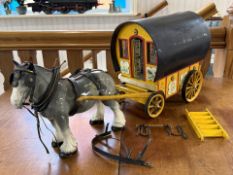 Large Wooden Vintage Model Gypsy Caravan, brightly coloured with ceramic horse.