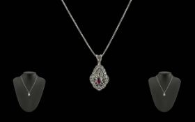 Ladies Pleasing 18ct White Gold Ruby & Diamond Set Pendant - Attached To A 18ct White Gold Chain.