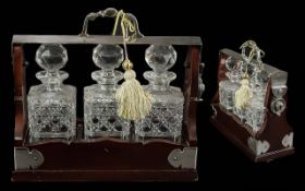 Vintage Tantalus, attractive design with three cut glass decanters,