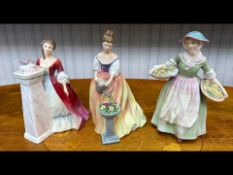 Three Royal Doulton Ladies, 'Alexandra' HN3286, 'Daffy Down Dilly' HN1712, and 'Rendezvous' HN2212.