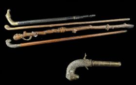 Four Wooden Walking Sticks,