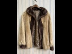 Beautiful Cream Mink Jacket, with coffee coloured collar and cuffs.