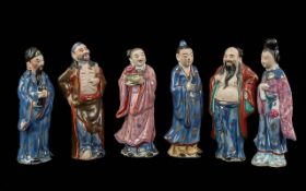 Chinese Famile Rose Decorated Set of Six Figures of Deities, picked out in various coloured enamels.