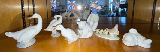Two Pieces of Lladro, a polar bear and a goose, together with five pieces of Nao.