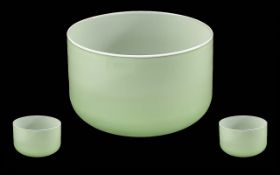 A Murano Glass Bowl of refined conical shape, the outer body in lime green with an opaque casing.