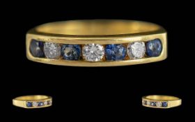 Ladies - Excellent 18ct Gold Channel Set