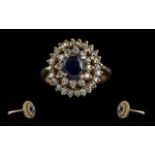 Ladies 14ct Gold Diamond & Sapphire Cluster Ring - Flowerhead Design. The Central Blue Sapphire