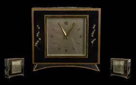 Elliott Black Lacquered Enamelled Floral Decoration Mantle Clock, marked Benson London, and