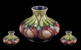 Moorcroft Tube Lined Squatted Vase - Of Pleasing Design. April Tulip Design. Date 2002. Designer
