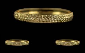Ladies Pleasing Quality 9ct Gold Diamond Cut Bangle - Pleasing Design. Weight 8.4 grams. Excellent