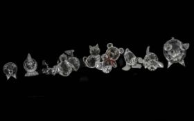 Collection of Swarovski Boxed Figures, to include a small and large Pig, Cat, Dog, Duck, Chicken,