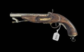 44 Calibre Percussion Pistol. Steel barrel and ram-rod with brass mounts. Overall length 14''.