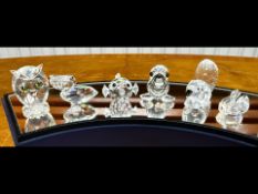 Six Small Swarovski Boxed Figures, to include an owl, a walrus, an anteater, a pelican, a swan and a