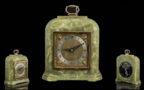 Green Onyx Elliott Mantle Clock, silver chapter dial with Roman numerals. Marked to dial an