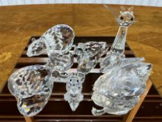 Six Small Swarovski Boxed Figures, to include a swan, a seal, a polar bear, a cat, a fish and a