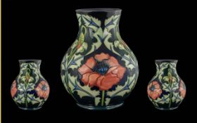 Moorcroft Tube Lined Globular Shaped Vase - Of Large Size. Poppy & Thistle Design On Blue Ground.