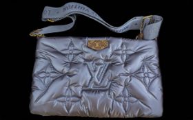 Genuine Louis Vuitton Maxi Multi Pochette, Navy Blue, crafted from quilted Econyl nylon fabric