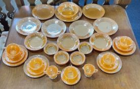 1960's American Carnival Glass Tea/Dinner Set by 'Fire King', comprising six cups, saucers and