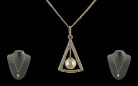 Ladies 18ct White Gold Pearl Set Pendant - Attached To A 18ct White Gold Chain. Both Marked 750 (