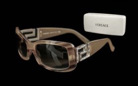Genuine Versace 4111-B Ladies Sunglasses, with brown tortoiseshell frame and the brand's iconic