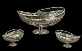 A Fine Quality Victorian Silvered Metal Swing Handled Basket, finely fretted to the body and with an