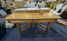 Extending Dining Table with two extra leaves, cross section supports.