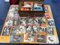 Antique Leather Bound Lever Lock Suitcase, filled with a large quantity of Forum magazines, together