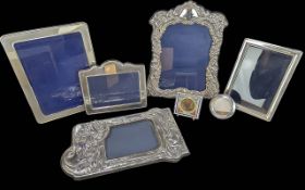 Collection of Mixed Sized Silver Photo Frames, six in total, together with a small mosaic gilt metal