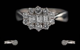 Ladies - Quality 18ct White Gold Brilliant and Baguette Cut Diamond Set Ring. Full Hallmark to