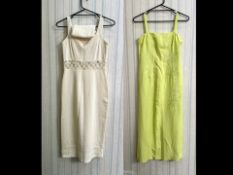 Two Designer Summer Dresses, comprising a cream cotton long sleeveless sun dress with crochet trim