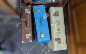 Three Vintage Suitcases, comprising one blue, one brown and one cream, with cream fittings.