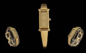 Ladies Gucci Gold Tone Watch.