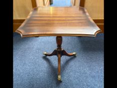 Tilt Top Mahogany Tripod Table on casters. Height 22'', top 20'' diameter. Together with a tray in