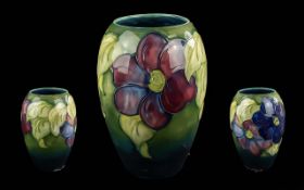 William Moorcroft Handpainted Ovoid Shaped Vase - Clematis- Hibiscus Design On Green Ground.