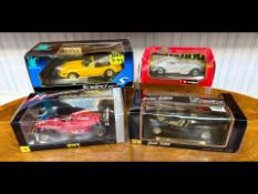 Four Boxed Model Cars, to include Burago Burrati Atlantic, Onyx Formula One Car, Maisto Jaguar