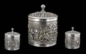 Continental Antique Embossed Lidded Box, depicting a village scene with figures and horses, silvered