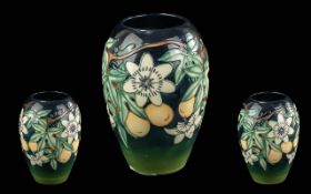 Moorcroft Handpainted Tube Lined Ovoid Shaped Vase - Passion Fruit Design On Blue Ground. Designer