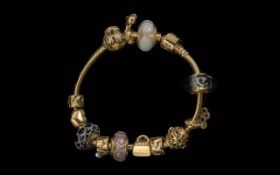 Pandora - Excellent 14ct Gold Bracelet Loaded with 9 x 14ct Gold Pandora Charms. Marked 585 -