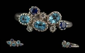 Ladies Exquisite 18ct White Gold Blue Topaz Diamond and Sapphire Set Ring. Pleasing Design / Border.